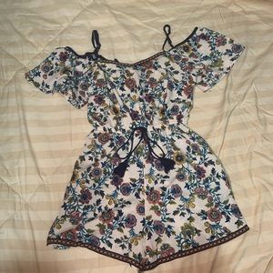 Floral romper with adjustable straps